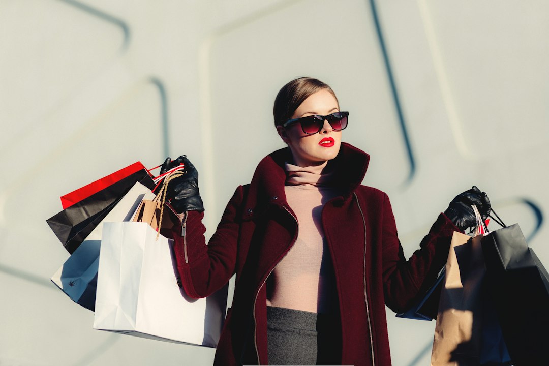 Shoppers browsing coats inside a large Philadelphia-area department store