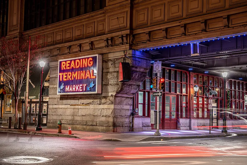 Reading Terminal Market sign lit up at dusk