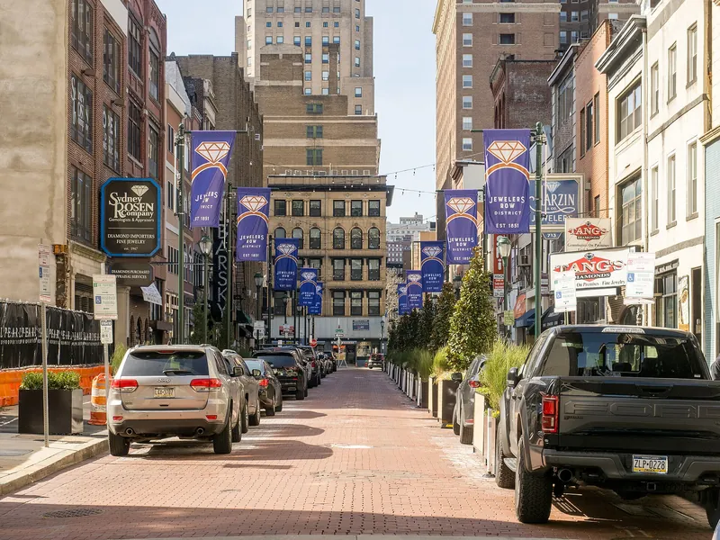 Sansom Street lined with Jewelers' Row banners and storefronts